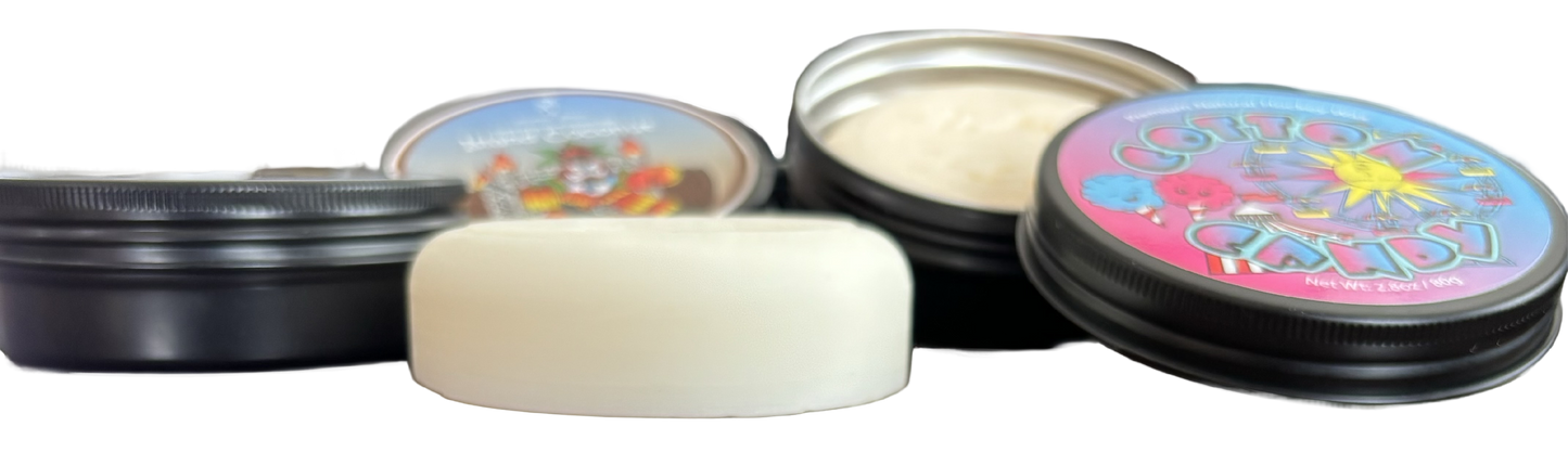 Sniper Sauce hockey stick wax side view including the tins with screw top lids.
